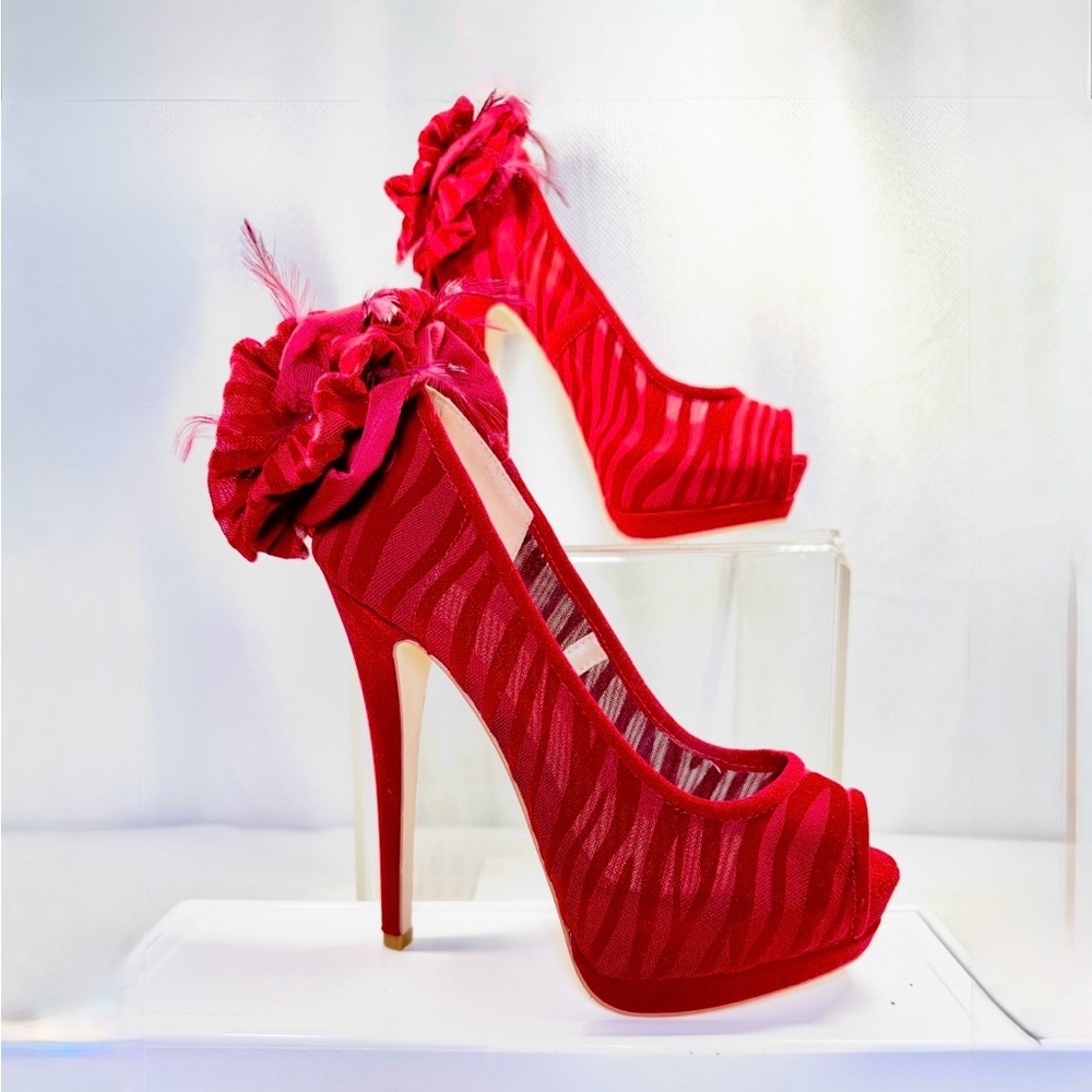 JustFab 80s inspired red velvet zebra print stilettos with rosettes and feathers